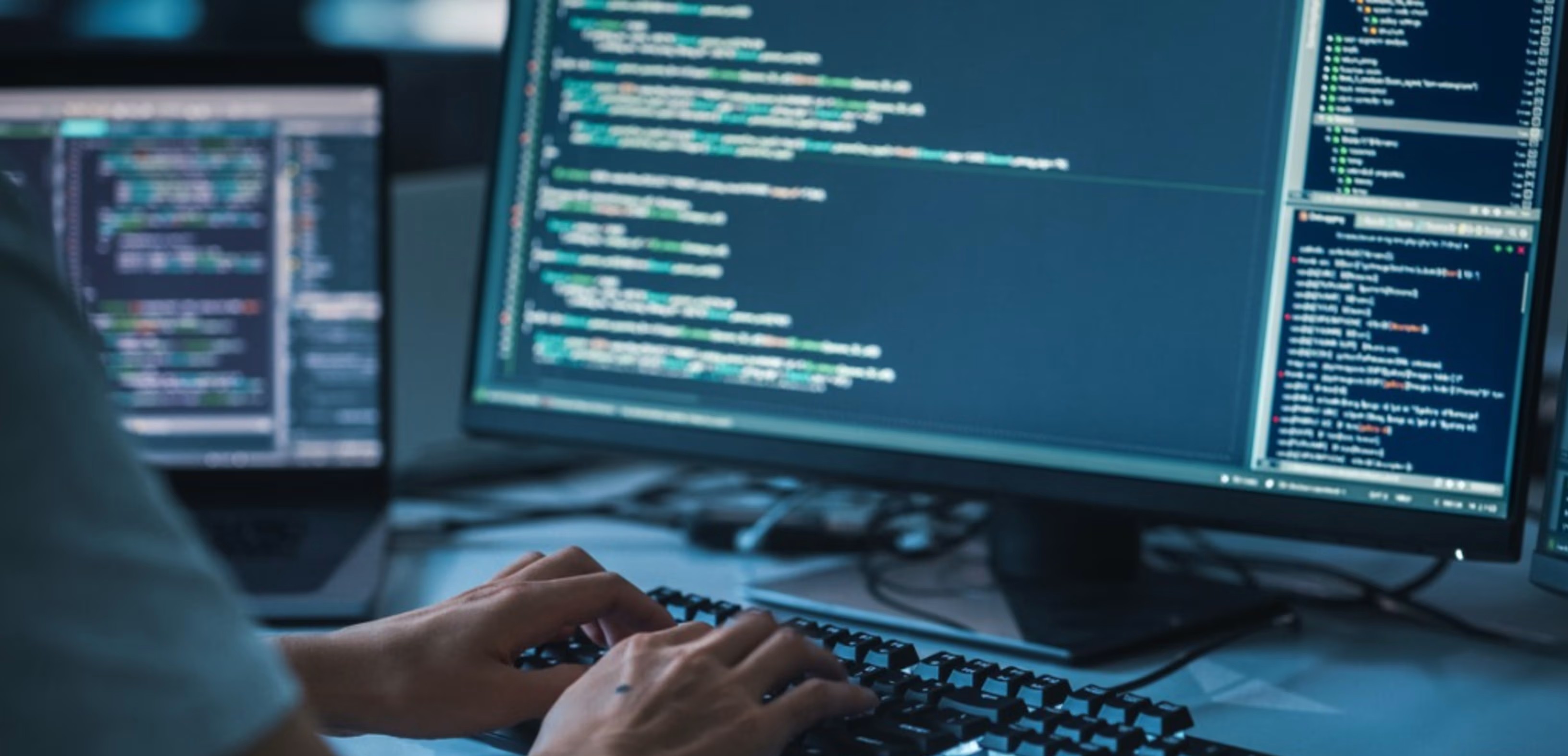 Indian IT professionals working on technology projects in a US office